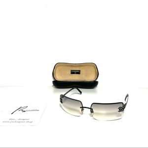 SOLD DO NOT PURCHASE Rimless Black and Grey Chanel sunglasses